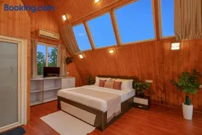 ELIVAAS Signature Malik Farms Countryside Wooden Cottage on 2 Acre Estate with Shared Pool, Garden & Restaurant - Image 4