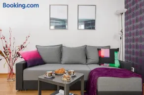 Elektoralna 12A - Colorful Apartment with Balcony by Noclegi Renters - Image 4