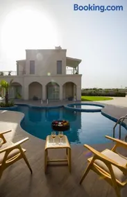 ELIVAAS Signature Villa Fiorita Stunning Mediterranean-Style 3 BHK Villa With Outdoor Pool, Bar & Hill Views - Image 1