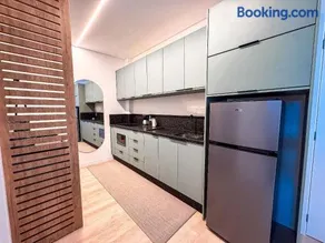 Apto com 1 quarto e sacada com churrasqueira - Image 1