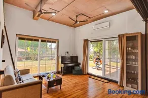 SaffronStays Deckhouse 47 - 3BR pet-friendly industrial-style pool villa with bonfire, BBQ, rain dance & celebration turf - Image 4