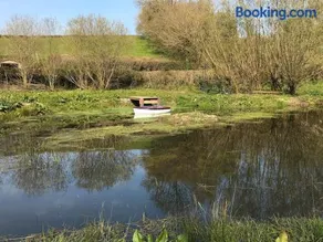 Idyllic countryside cabin with stream and lake - Image 3