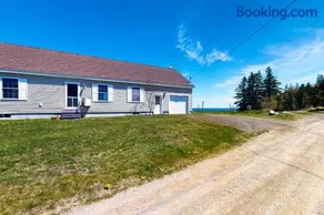 Tranquil getaway on the coast with beach access, ocean views, & screened porch - Image 1