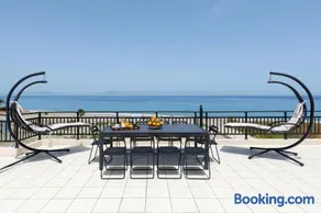 White & Blue Beachfront Luxury Villa - Image 2