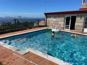 Casa con jardín, piscina privada y vistas a las Islas Cies - Image 1
