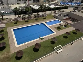 Apartamento con piscina, gimnasio y parking en Alicante by Turihome - Image 2