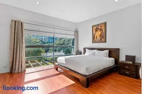 Sleek Modern Pad next to Spark Arena Zodiak Stays - Image 2