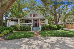 Historic Cottage Under the Oaks, Walk to Pier Village, Porch & Loft - Image 1