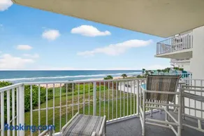 Direct oceanfront 2/2 corner condo with large balcony, heated pool, and garage parking - Image 2