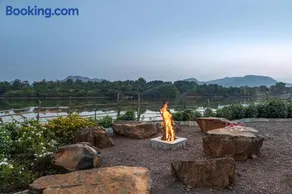SaffronStays Lake House Marigold - 4 individual cottages with plunge pools near Sula Vineyard, Nashik - Image 2