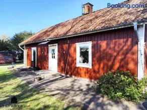 Charming red cottage in Vaderstad SE10024 - Image 1