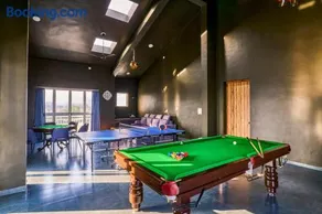 SaffronStays Six Oaks - 4BR Lakeside Villa with Pool, Games Room & Backwater Views - Image 3