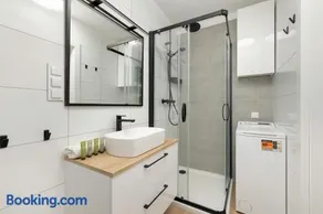 Seaside Apartment with Parking, Air Conditioning and Elevator Close to the Beach by Noclegi Renters - Image 3