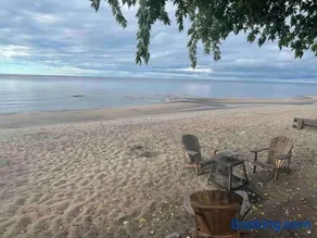 Les pieds dans le sable - Image 1