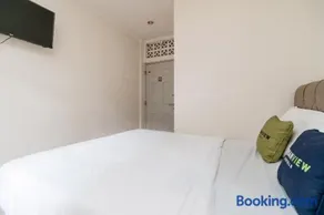 Urbanview Hotel Minongga Pondok Labu by RedDoorz - Image 5