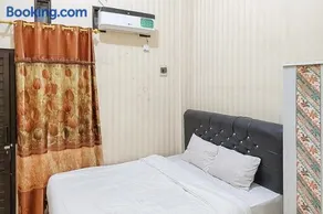 Icha Homestay near Terminal Purabaya Madiun - Image 1