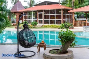 SaffronStays Euphoria Shores - 6BR villa with bar counter, pool & lawns 400m from Kihim Beach in Alibaug - Image 4