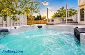 Stunning Home in the Suburb with Hot Tub - Image 1