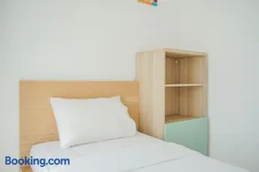 Spacious and Elegant 2BR M-Town Serpong Apartment By Travelio - Image 3