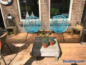 BelleMare Bungalow Lauwersmeer mit überdachte Veranda und eingezäuntem Garten - Image 4