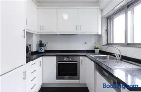 Host Wise - Deluxe Modern Flat w Balcony - Image 3
