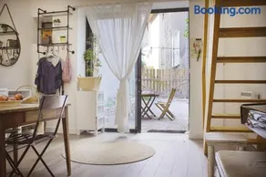 Duplex dans village avec jardin - Image 1
