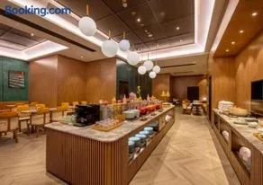 Orange Hotel Yuyao Colorful City - Image 2