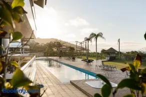 Apartamento com 4 suítes pé na areia - Image 1