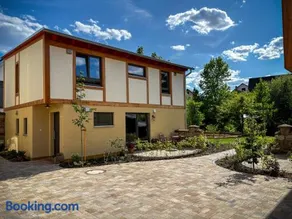 Amber Ferienhain - Ferienhaus 'Magnolie' mit verwunschenem Garten & privater Sauna - Image 1