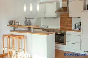 Merveilleux appartement de vacances adapté aux familles avec terrasse, sauna et jardin | Vue jardin - Image 3