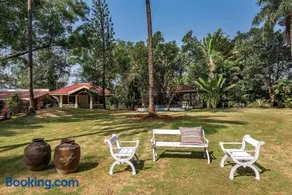 SaffronStays Foresta by the Lake - 6BR veg-only pool estate with lake views, lawns, gazebo & sports court in Kamshet - Image 3