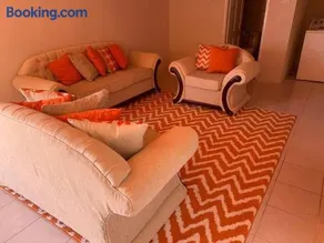 Lovely 2 bedroom condo with WiFi in a quiet area, 7-10 minutes away from both the airport and Oistins - Image 1
