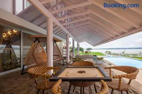 StayVista's Eva Villa - Lakeside Luxury with Modern Decor, Pool & Expansive Lawn - Near Sula - Image 3