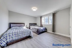Stunning 7 Br RougeView Home with 2 Kitchens, 5 Bathrooms, Amazing Backyard & 8-Car Parking - Image 1