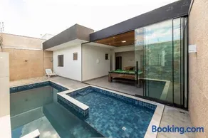 Casa Munique Maringa Com Piscina Ar Condicionado e Churrasqueira - Image 5
