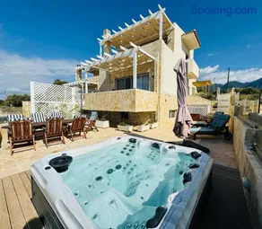 Villa Arkadia Seafront Villa Ai-Lagoudis Beach - Image 1