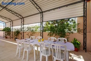 Villa con giardino e barbecue | Vista sul giardino - Image 1