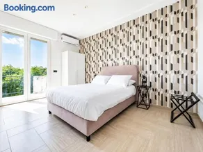 RespSuite - Novara Est 2 Camere, 2 Bagni e Garage - Image 1
