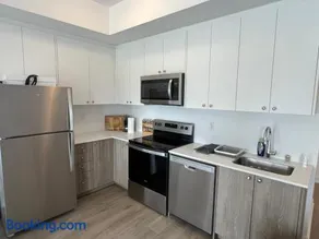 Stylish 2-Story Condo with Balcony - Image 5