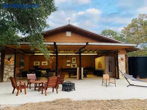 The Camp Blanco by Lodgewell - Riverfront retreat 2 Homes, Bunk House, Game Room & more - Image 1