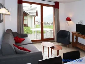 Chalet mitoyen aux Orres 1800 avec piscine, sauna, hammam, parking et prestations incluses - FR-1-322-102 - Image 1