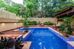 StayVista's The Happy Hive - Cozy rooms and a pool for a delightful stay - Image 2