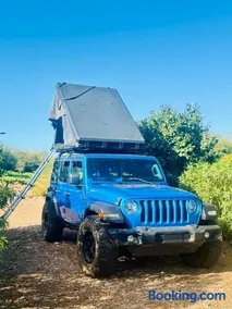 Embark on a journey through Maui with Aloha Glamp's jeep and rooftop tent allows you to discover diverse campgrounds unveiling the island's beauty from unique perspectives each day - Image 4