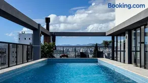 Luxo em Floripa, Apto novo com sala, suíte, garagem e área de lazer com piscina e churrasqueira em bairro nobre de Florianópolis - Image 1
