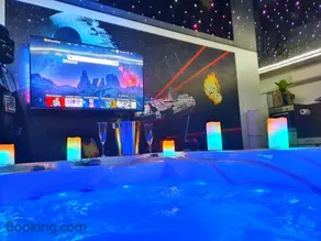 GALAXY SPA-4 Pers-Jacuzzi-Insolite-Parking-Jardin-Clim-Colmar - Image 1