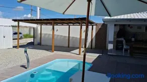 Casa com piscina e espaço gourmet a 30m da praia! - Image 4