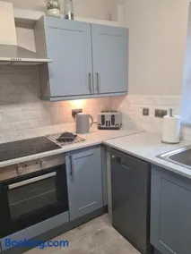UlsterApartments one bedroom 2 single beds and sofa bed - Image 3