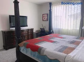 Large master bedroom with Separate bathroom and work desk on the first floor - Image 3