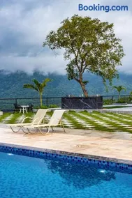SaffronStays Sundowner - 8BR Morbe-view villa, grand pool, outdoor bar, gazebo, TT & pool table, rain dance, award-winning - Image 5