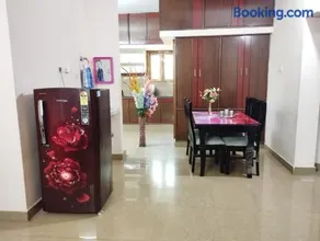 SLS Homestay - Luxury AC Service Apartments 1BHK, 2BHK, 3BHK - Direct Flyover to Alipiri Tirumala Gate - Walk to PS4 Pure Veg Restaurants, Supermarkets - Near to National Highway & Padmavathi Amma Temple - Modular Kitchen, Living room -Free Superfast Wifi - Image 3